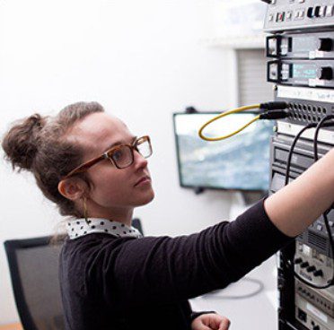 Color photo of audiovisual archivist Libby Hopfauf 