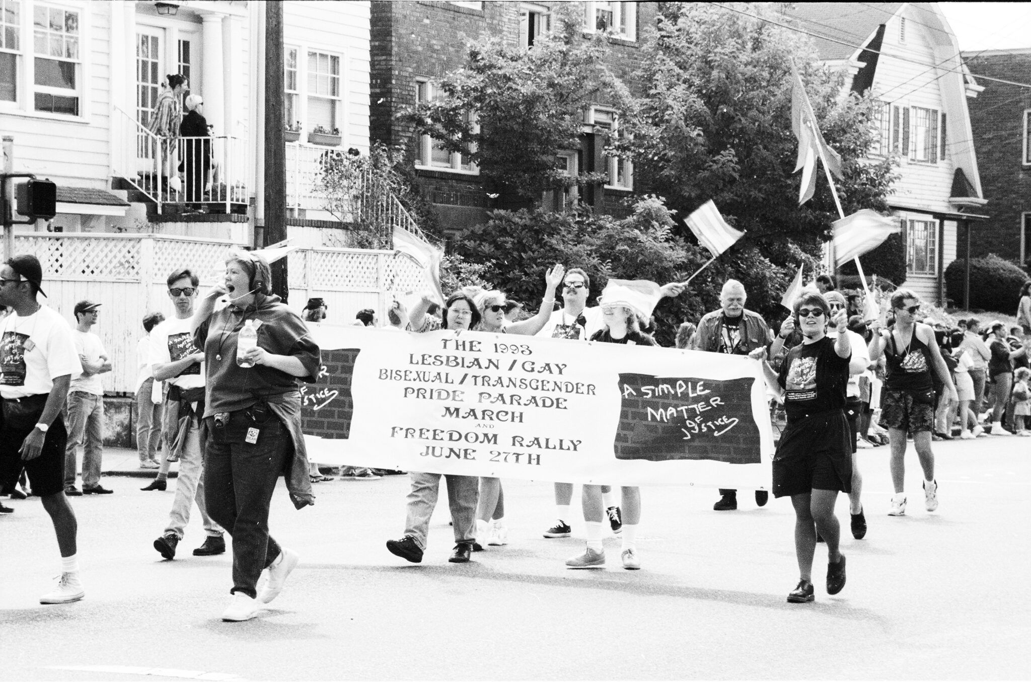 Black and white photo of marchers in the 1993 Gay Pride Parade in Seattle