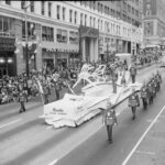 black and white photo of Seattle City Light float in 1959 Seafair parade